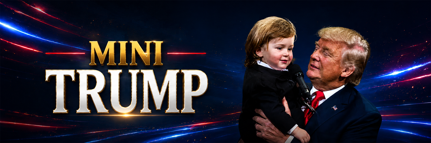 Mini Trump — Donald Trump holding Hunter at the rally